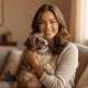 Portrait of Sarah M, a happy adopter with warm smile and brown hair